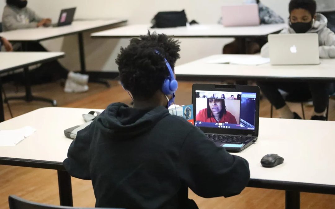 A Jackson Public Schools student attends class on his laptop from a classroom at the Capitol Street campus of the Boys and Girls Club on Sept. 21, 2020. Normally an afterschool program, the Club began opening at 7 a.m. and facilitating distance learning for the children of working families after schools closed their doors due to the COVID-19 pandemic. Credit: Anna Wolfe