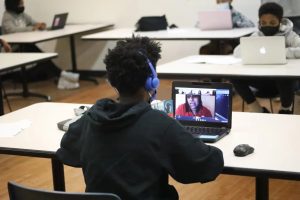 A Jackson Public Schools student attends class on his laptop from a classroom at the Capitol Street campus of the Boys and Girls Club on Sept. 21, 2020. Normally an afterschool program, the Club began opening at 7 a.m. and facilitating distance learning for the children of working families after schools closed their doors due to the COVID-19 pandemic. Credit: Anna Wolfe