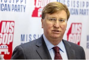 Gov. Tate Reeves answers questions from the media after signing qualifying paperwork to run for reelection at the Mississippi Republican Headquarters in Jackson, Miss., Tuesday, Jan. 3, 2023. Credit: Eric Shelton/Mississippi Today