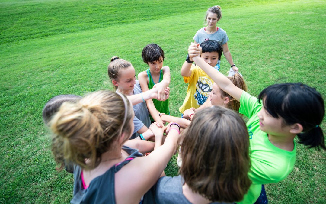 Children play games outside the Sanderson Center during a Youth Dawgs camp at MSU. (OPA Photo)
