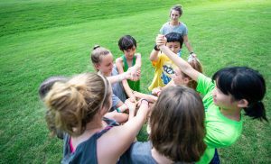 Children play games outside the Sanderson Center during a Youth Dawgs camp at MSU. (OPA Photo)