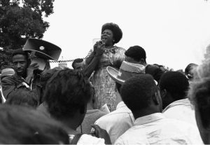 In this Sept. 17, 1965 file photo, Fannie Lou Hamer, of Ruleville, Miss., speaks to Mississippi Freedom Democratic Party sympathizers outside the Capitol in Washington after the House of Representatives rejected a challenger to the 1964 election of five Mississippi representatives. Historically, black women have been no strangers to the quest for social change. But historians say they have often been overshadowed, first by white women during the suffragette movement and then by the black men who were lionized during the civil rights movement Credit: AP Photo, William J. Smith