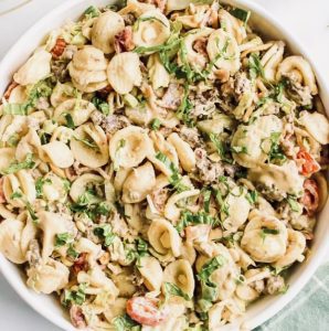 Cheeseburger in Paradise Pasta Salad is the perfect summer salad filled with ground beef, pasta. vegetables and a special burger dressing.