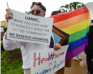 Demonstrators gathered across from the Unversity of Mississippi Medical Center to protest UMMC's decision to close TEAM Clinic that provided care for the LGBTQ+ community, Tuesday, June 6, 2023 in Jackson. Credit: Vickie D. King/Mississippi Today