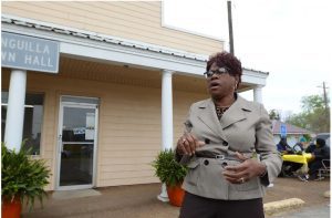 Anguilla Mayor Jan Pearson, coordinating relief efforts outside town hall for residents effected a recent tornado. FEMA representatives (right) assist residents with paperwork, Wednesday, March 29, 2023.