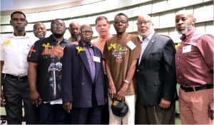 U.S.Secretary of Labor Marty Walsh (6th from left) and U.S. Rep. Bennie Thompson (second right) with Black farmers in the Delta involved in the Pitts Farm lawsuit, during a meeting at the Mississippi Center for Justice in Indianola, Thursday, June 30, 2022. Credit: Vickie D. King/Mississippi Today