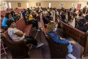 Supporters and potential voters listen as Brandon Presley, the Democratic candidate for governor, speaks at St.Luke M.B. Church in Dundee, Miss., Wednesday, May 3, 2023. Credit: Eric Shelton/Mississippi Today