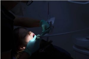 A dentist provides dental care to a little girl, France on June 28, 2023. llustration of the profession of dental surgeon who is a health professional specializing in the management of pathologies of the teeth and gums. Photo by Thibaut Durand / Abaca/Sipa USA(Sipa via AP Images)