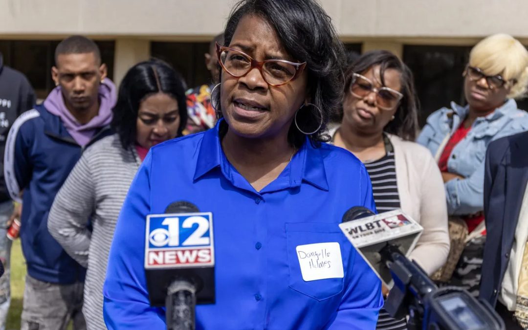 Danyelle Holmes, of the Mississippi Poor People's Campaign, center, speaks during a Mississippi Rapid Response Coalition press conference about Jackson's water issues at the Mississippi E-Center at Jackson State University in Jackson, Miss., Wednesday, March 22, 2023. Credit: Eric Shelton/Mississippi Today