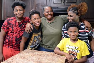 Roberta Bell, 58, relaxing at her Warren County home with her grandchildren (from left), Jayden Cooper, 12, Caileb Cooper, 11, Tahari Bell, 13 and Demonie Bell, 9, Tuesday, Aug. 1, 2023.
