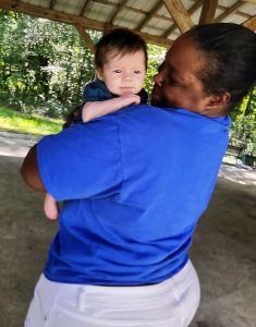 Roberta Bell visiting with baby Kayson. Bell lost her job as a correctional officer after she volunteered to raise the baby during Katie Bourgeios's incarceration.