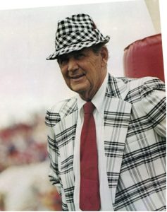 Bear Bryant in his customary pre-game position: Leaning on a goal post. (Photo courtesy University of Alabama)