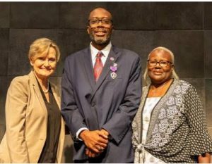  Senator Hyde-Smith with Purple Heart Recipient Victor Hogan and his mother Phyllis Hogan. 