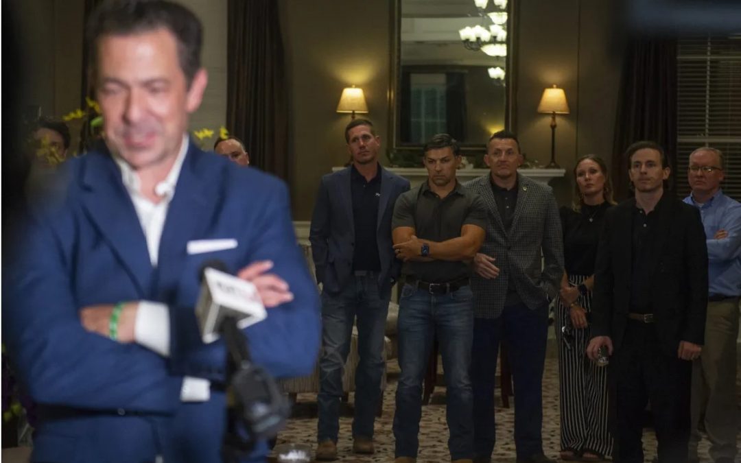 Chris McDaniel's campaign staff looks on as Republican State Sen. Chris McDaniel speaks to the media and his supporters at the Biloxi Visitors Center on Tuesday, Aug. 8, 2023 in Biloxi, Miss. (Hannah Ruhoff/The Sun Herald via AP)