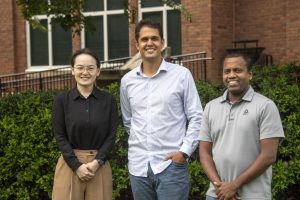 From left to right, Xin Zhang, Vitor S. Martins and Nuwan Wijewardane, MAFES scientists and assistant professors in Mississippi State's Department of Agricultural and Biological Engineering, are building high-tech tools to maintain soil health through a grant from the National Institute of Food and Agriculture. Postdoctoral fellow Lucas Ferreira, not pictured, also supporting all aspects of the research project. (Photo by Dominique Belcher)