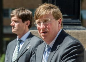 Gov. Tate Reeves and Mississippi State Health Officer Dr. Thomas Dobbs speak to the media about the coronavirus during a press conference at the Governor's Mansion in Jackson, Miss., Thursday, March 26, 2020. Credit: Eric J. Shelton/Mississippi Today, Report For America