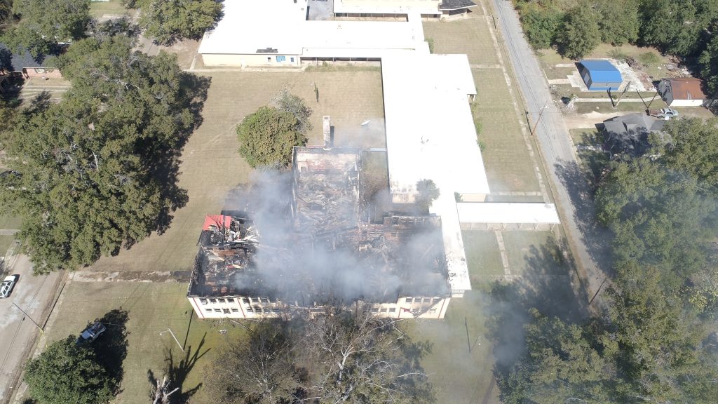 AERIAL PHOTO OF THE DAMAGED BUILDING 
