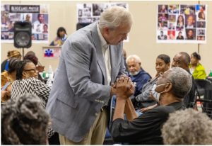 Democratic gubernatorial candidate Brandon Presley visits with supporters during a forum concerning health at L.T. Ellis Community Center in Laurel, Miss., on Wednesday, Sept. 27, 2023.