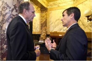 Lt. Gov. Delbert Hosemann, left, confers with Senate Appropriations Committee Chairman Briggs Hopson, R-Vicksburg, in Senate Chambers at the Capitol in Jackson, Miss., Wednesday, March 24, 2021. (AP Photo/Rogelio V. Solis)