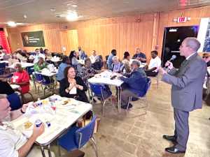 Dr. Daniel Ennis, President of Delta State University, giving remarks at historic Club Ebony.