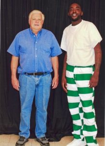 Charles Young, right, is incarcerated at the South Mississippi Correctional Institute in Leakesville. More than three weeks ago began experiencing a medical condition that has left him with blood in his urine, pain and weakness. He is pictured with visitor Mike Vickery, who has visited Young in prison to study the Bible. Vickery is the close friend of a man named Clifford Austin who Young was incarcerated with.