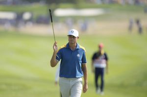 Europe's Ludvig Aberg acknowledges the crowd on the 2nd green during his singles match at the Ryder Cup golf tournament at the Marco Simone Golf Club in Guidonia Montecelio, Italy, Sunday, Oct. 1, 2023. (AP Photo/Andrew Medichini)