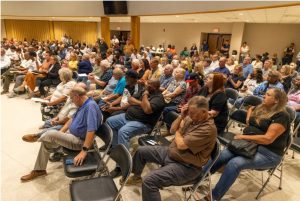 Ocean Springs residents listen as other residents express their concerns with the city’s proposed Urban Renewal Plan during a public hearing at the Ocean Springs Civic Center on Monday, Oct. 2, 2023.