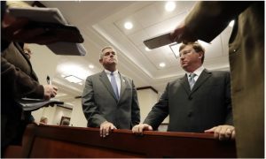 Then Lt. Gov. Tate Reeves, right, and Speaker Philip Gunn, left, answer reporters' questions following a meeting of the Joint Legislative Budget Committee in Jackson, Miss., Wednesday, Nov. 1, 2017. (AP Photo/Rogelio V. Solis)