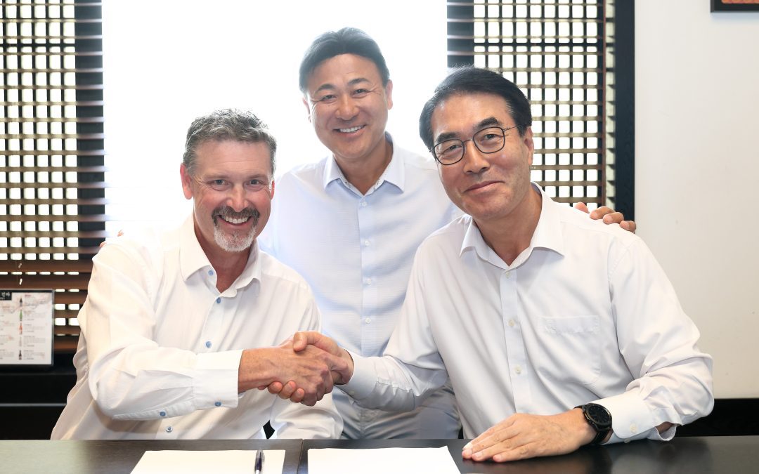 Robert Taylor (left), President and COO of the Taylor Group of Companies; Stan Park (center), President, HD Hyundai Construction Equipment North America; and Choi Cheol-gon, CEO, Hyundai Construction Equipment, celebrate the expansion in Kentucky and Mississippi of Taylor Construction Equipment’s dealership territory.