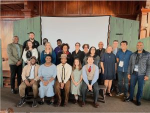 National, state and local arts and humanities leaders pose with cast and crew members of "Anne and Emmett," a New Stage Theatre production in partnership with NEH's United We Stand initiative, at Tougaloo College's historic Woodworth Chapel.