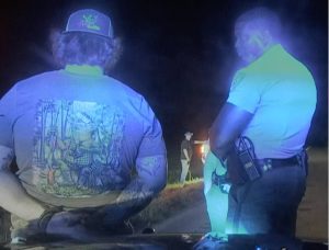 This screen shot shows Capitol Police officer Steven Frederick, left, being arrested by an unidentified Covington County County deputy on a DUI charge on March 12, 2023, after crashing his vehicle and tested at almost twice the blood alcohol content limit.. Credit: Courtesy of Mississippi Highway Patrol