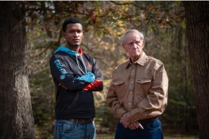 Christopher Holloway, left, and Sam Carter said they were repeatedly shocked with a Taser during a home raid. Both were charged with paraphernalia and drug possession. Mr. Carter said the raid was the beginning of a string of arrests. Photo Credit: Rory Doyle for The New York Times