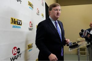 Mississippi Gov. Tate Reeves speaks with reporters following the televised gubernatorial debate with the Democratic nominee Brandon Presley, Wednesday, Nov. 1, 2023, in Jackson, Miss. (AP Photo/Rogelio V. Solis)