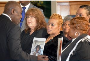 Civil-rights attorney Ben Crump speaks to three mothers—(from left) Gretchen Hankins, Mary Moore Glenn and Bettersten Wade—on Dec. 20, 2023. The women said Hinds County officials approved their sons for burial at the Hinds County Penal Farm before notifying their families of their deaths. Photo by Shaunicy Muhammad