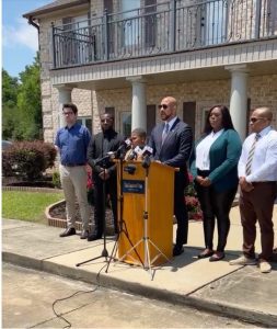 Attorney Carlos Moore holds news conference Tuesday, May 30, 2023, outside his Grenada law office to announce the filing of a $5 million lawsuit against the city of Indianola, the police chief and Officer Greg Capers in the shooting of 11-year-old Aderrien Murry. Credit: Photo courtesy of Carlos Moore