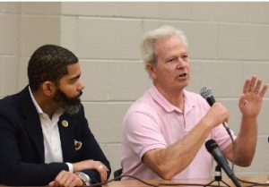 Mayor Chokwe Antar Lumumba (left) and water system’s third-party administrator Ted Henifin, answer questions regarding the current state of the city’s water system during a town hall meeting held at Forest Hill High School, Wednesday, Dec. 7, 2022. Credit: Vickie D. King/Mississippi Today