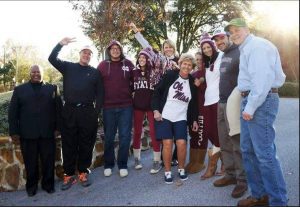 Brickell Williamson, in Ole Miss tee shirt, pals around with family members in Meridian before heading to the 2013 Egg Bowl game in Starkville.