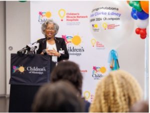 Dr. Ruth Patterson, Ava Clarke's pediatrician, tells audience members how Ava Clarke will be an outstanding representative for the state's only children's hospital.