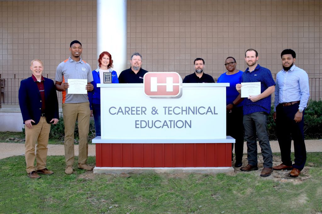 Josh Bower, Dean of Agriculture and Transportation/Director of Talent, Workforce & Economic Development; student Ryshun Watts of Ridgeland, Holly Gisman, Johns Manville Human Resources Manager ; Hinds Industrial Maintenance Technology Instructor Glenn Teele; Mechatronics Technology Instructor David Roberts, Brenda Myers, Mississippi state director in the Office of Apprenticeship at the U.S. Department of Labor; student John Toney of Mendenhall and Jonathan Townes, Vice President of Career and Technical Education, Sponsored Grants and HBCU Initiatives