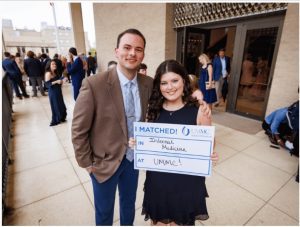 Fourth-year medical student Erin Sears and husband Jaylan Sears show off Erin's internal medicine match.