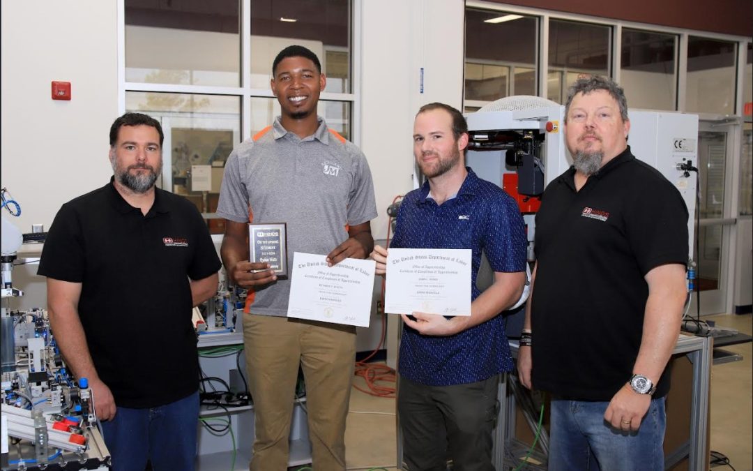 From left, Hinds Community College Mechatronics Technology Instructor David Roberts, students Ryshun Watts of Ridgeland, John Toney of Mendenhall and Hinds Industrial Maintenance Technology Instructor Glenn Teele. Watts and Toney served apprenticeships at Johns Manville in Richland. Watts was named Outstanding Student at Hinds