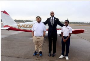 Moss Point School District Superintendent Oswego Harper, middle, and district officials spent more than a year building the foundation for Mississippi’s first Career and Technical Education Aviation Academy located in Moss Point, Miss. 