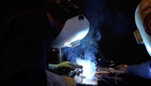 Students in Itawamba Community College’s welding class that has been funded by a grant from Metallica’s foundation, All Within My Hands, practice their skills during a recent class. – Photo Credit: C.J. Adams, ICC Community Relations