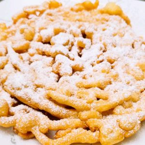 It’s easy to make funnel cakes at home, just like the fair treat that’s only offered one time during the year.