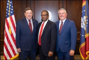 Commissioners Caldwell, Simmons and Busby