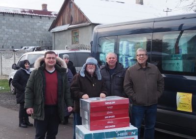 Heaters and generators are shared with a Ukraine pastor and his family for their church by (l to r) Pastor Oleg Gricyk, Bob Gilmore, Pastor Nikolai Sukhyna and Russell Kyzar.