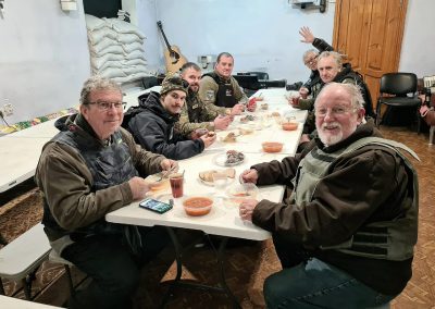 Lunch is served on the frontline in a shelter.