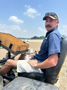 Hunter Lipsey, an entomology graduate student at MSU’s Delta Research and Extension Center in Stoneville, is studying the effects of insecticide loss on ThryvOn cotton varieties.[Photo credit]: Laura Hough Smith, DREC Communication Coordinator