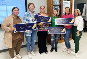 From left are Kayla Reggio, dyslexia therapist at Lighthouse Academy for Dyslexia in Ocean Springs; Lauren Houston, Lighthouse principal and dyslexia therapist; Cassandra Haydis, Stephanie Beauchamp and Crystal Naron, North Woolmarket Elementary educators; and Traci Barrientos, Lighthouse executive director.