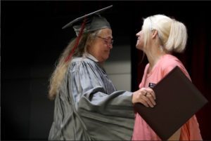 Melisa Temple, left, a native of Ripley, and a current inmate of the Central Mississippi Correctional Facility, was all tears as she received her High School Equivalency diploma from Hinds Community College Adult Education Instructor Jennifer Szarek.